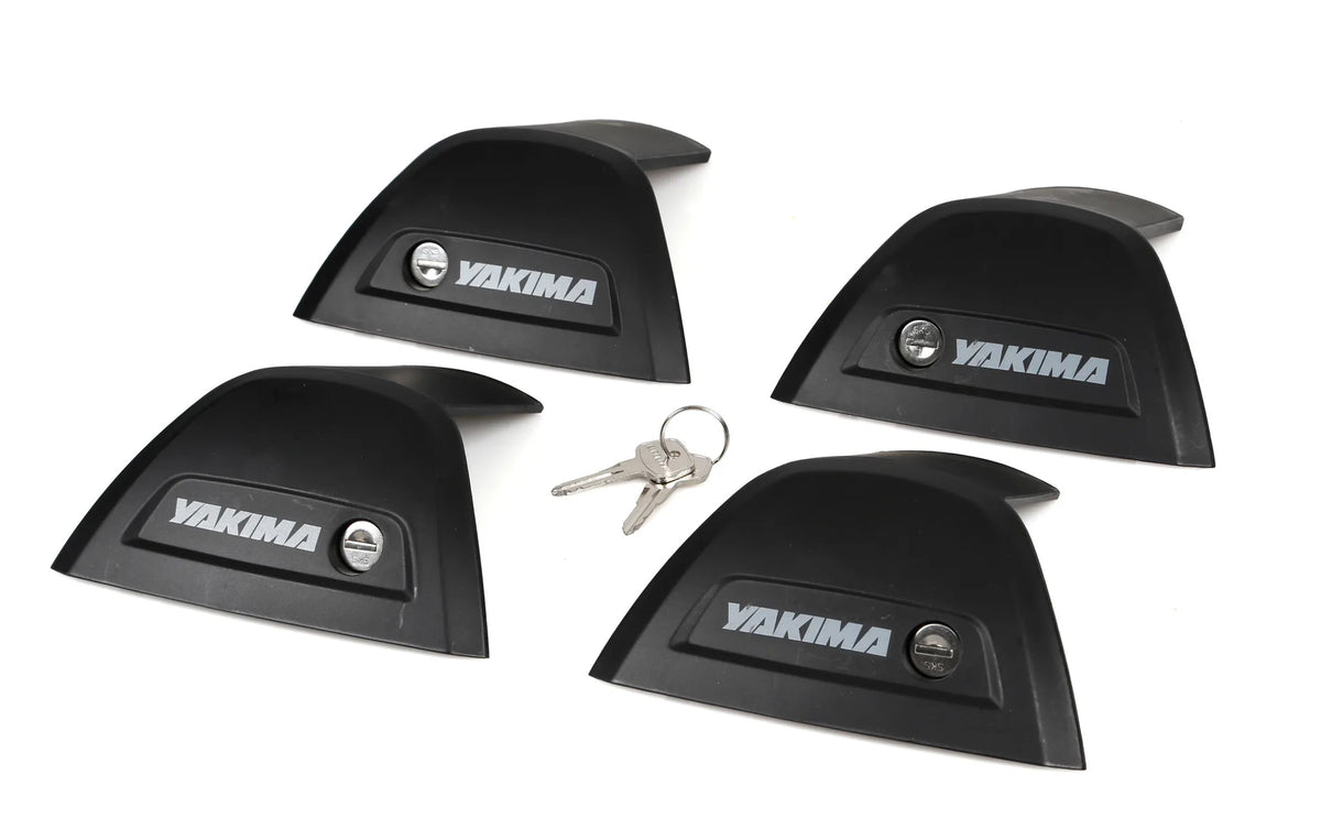 Cover ricambio 4 pz. per barre Yakima Flush e 2 chiavi Sks su fondo bianco