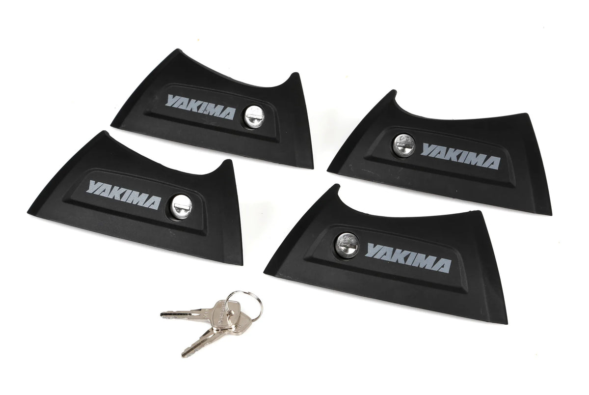 Cover ricambio 4 pz. per barre Yakima Thru e 2 chiavi Sks su fondo bianco