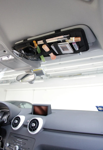 Strappy, organizer per visiera parasole montato sul veicolo